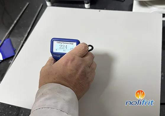 How many micrometers of enamel thickness can be controlled on a steel plate to prevent the enamel from peeling off?